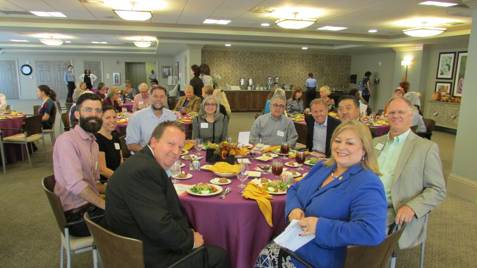 a group of employees sitting together