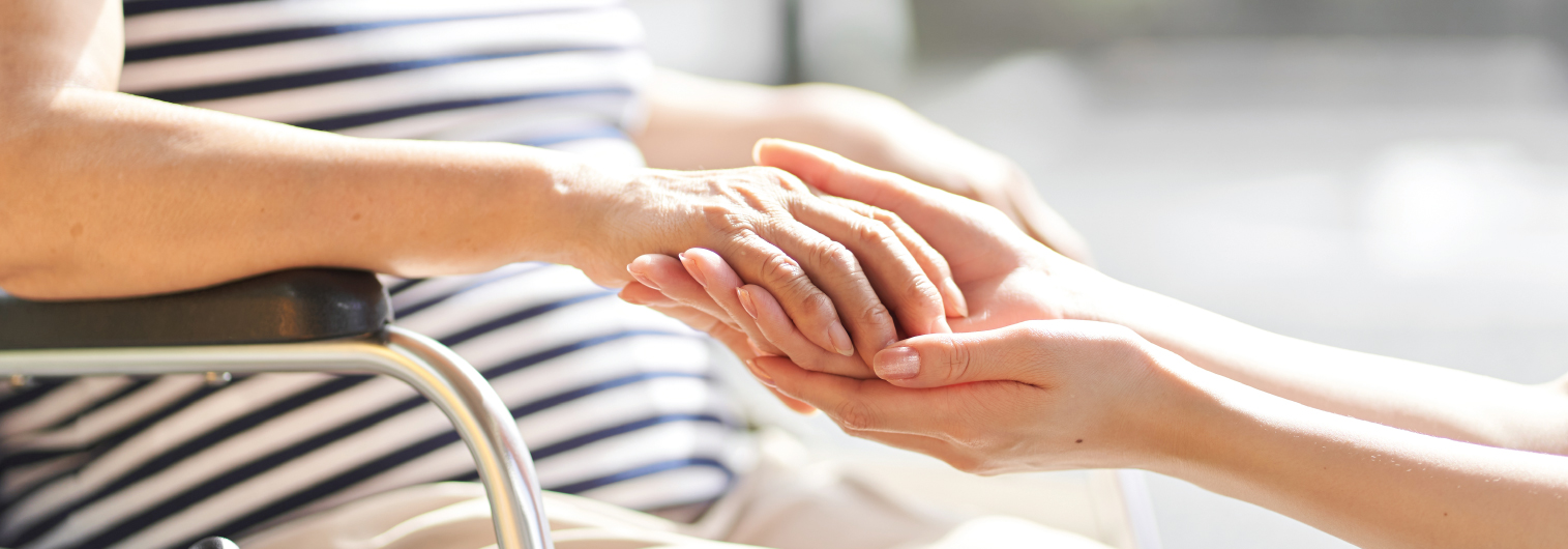 holding seniors hands