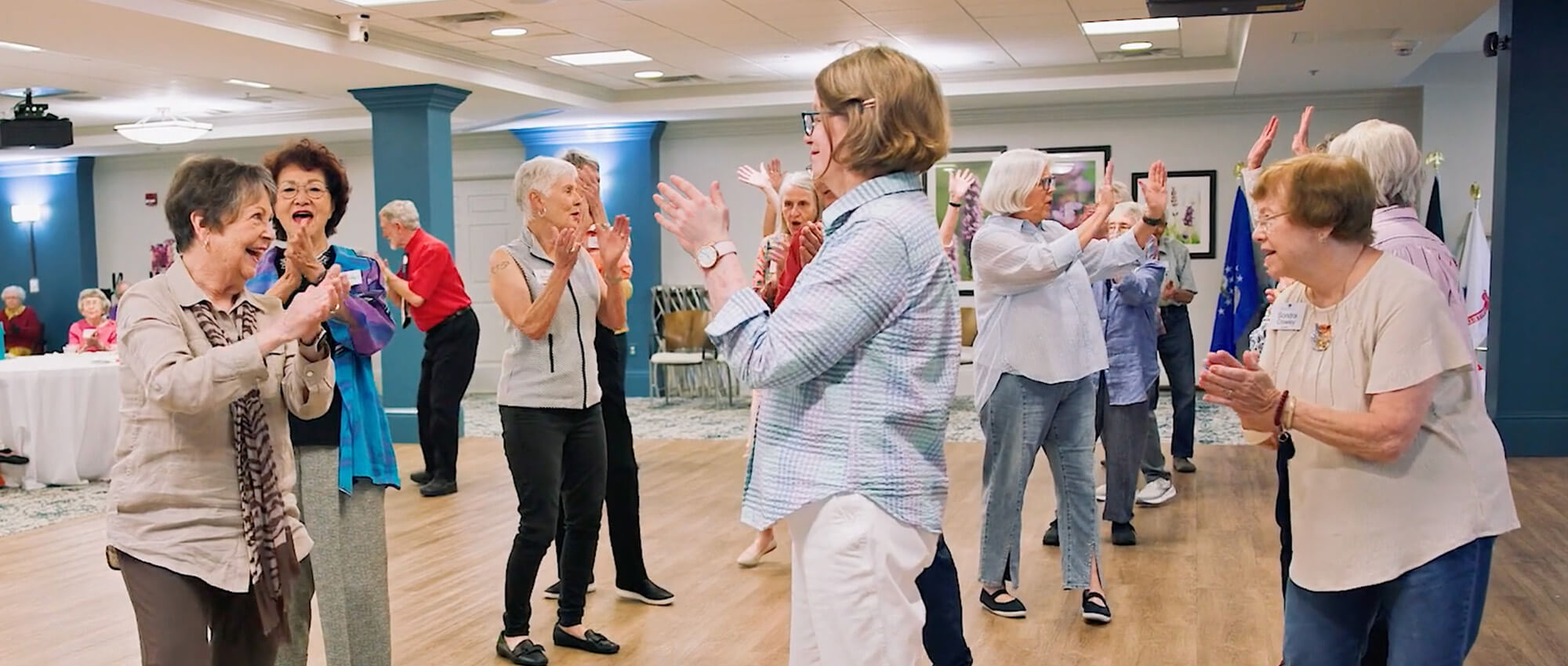 Residents clapping after line dance