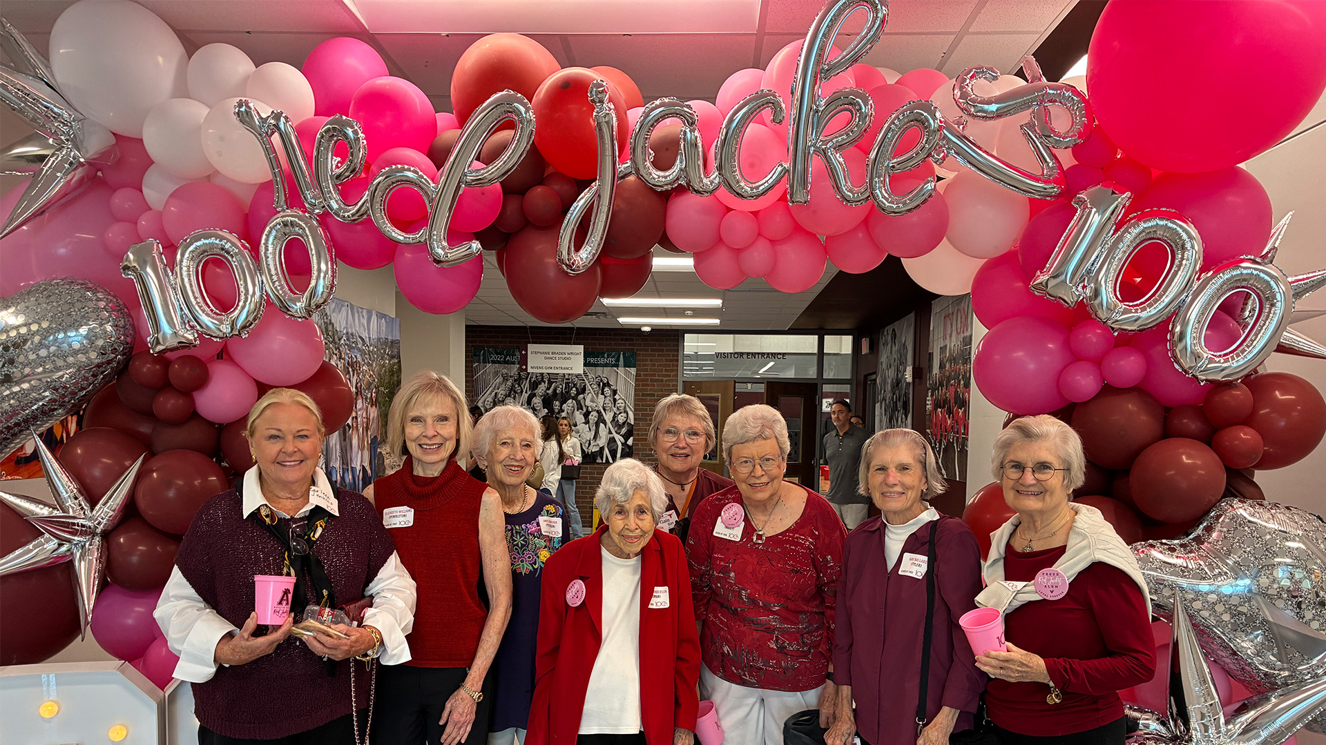 Residents celebrating 100 years of Austin Highschool Red Jackets team