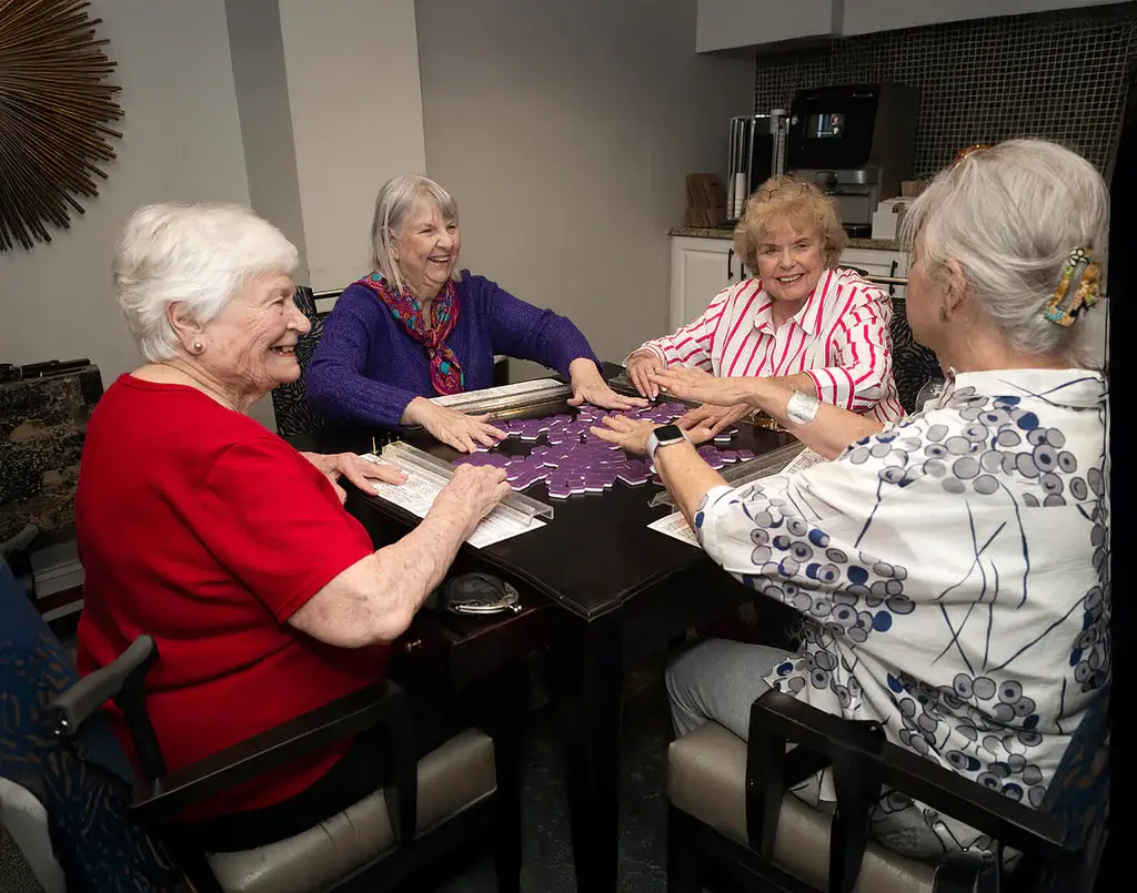 Group of women playing Mahjong