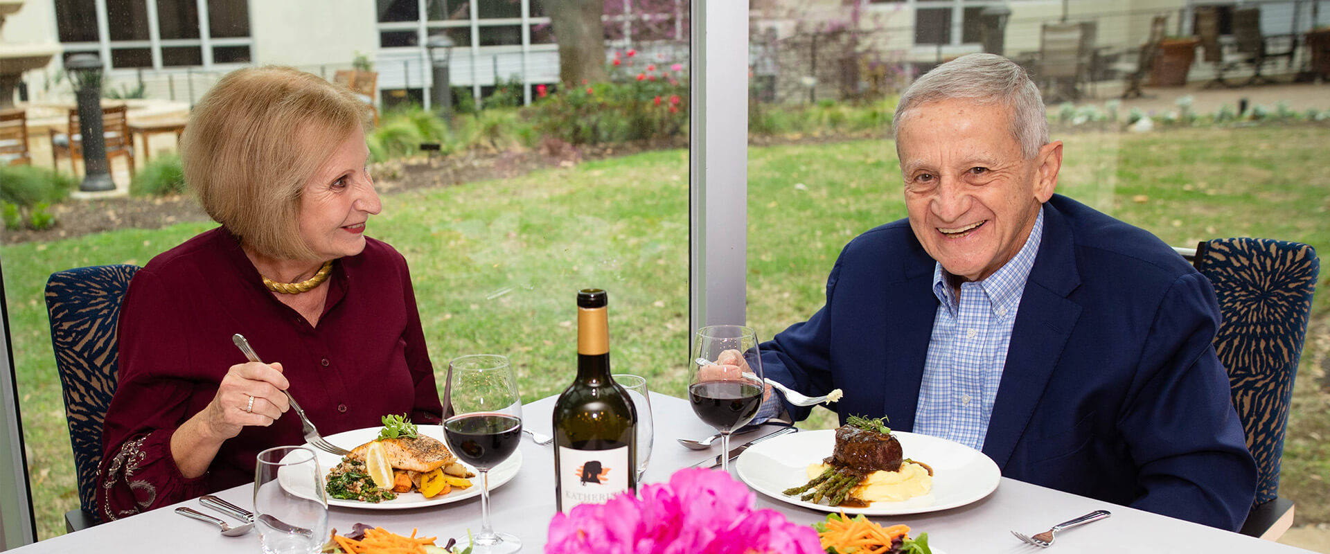 Senior couple dines outdoors at Westminster