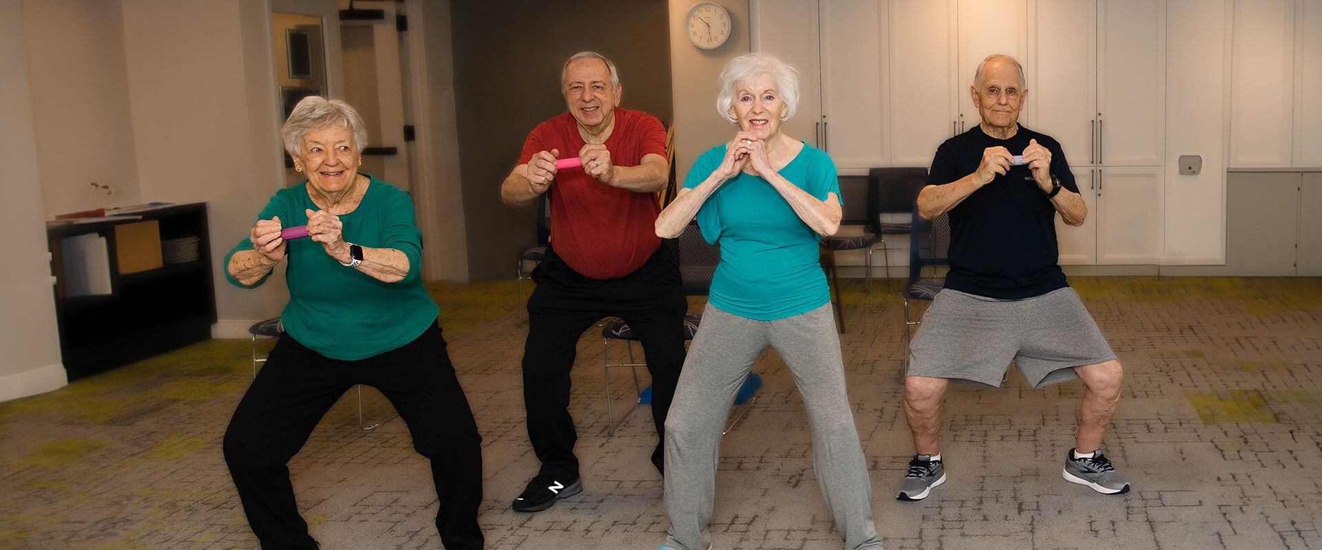 seniors workout and exercise in a group